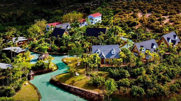 Log cabins in Sino-Nature Garden at Sanya’s Damao Village in southern Hainan province.